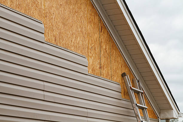 Professional Siding Installation technician working in Rittman, OH